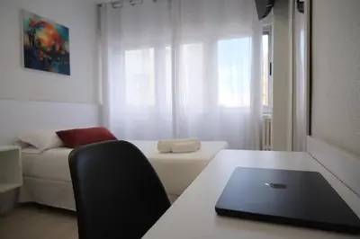 Cama o camas de una habitación en Hotel Gabriel y Galán