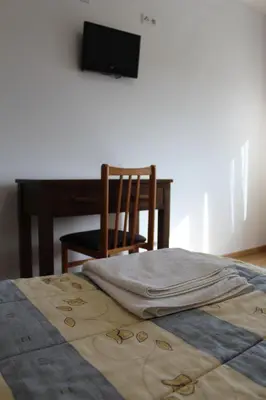 Cama o camas de una habitación en Hostal Mirobriga