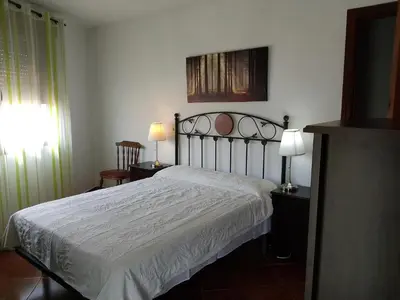 Cama o camas de una habitación en EL VIEJO OLMO