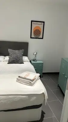 Cama o camas de una habitación en LOFT URBANO