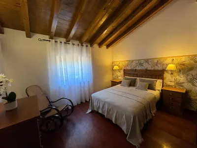 Cama o camas de una habitación en Complejo Rural Los Cachos