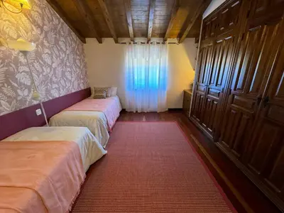 Cama o camas de una habitación en Complejo Rural Los Cachos
