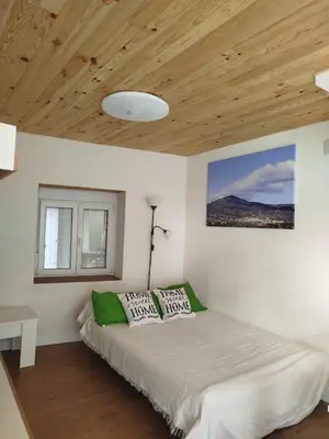 Cama o camas de una habitación en Berrocal de Aldea en Cabo