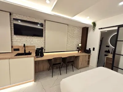 Una cocina o zona de cocina en La Parada del Rey - Luxury Suites