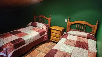 Cama o camas de una habitación en Casa 