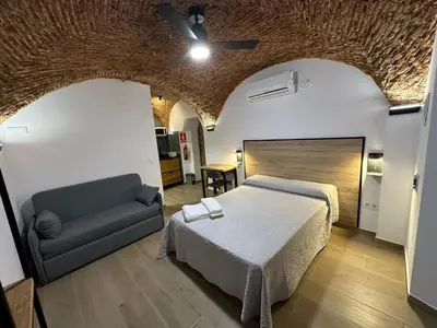 Cama o camas de una habitación en Entre Bóvedas