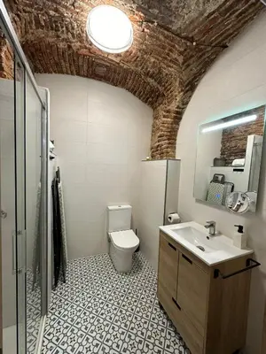 Un baño de Entre Bóvedas