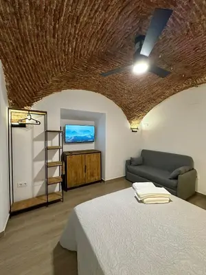 Cama o camas de una habitación en Entre Bóvedas