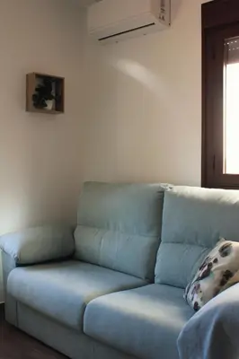 Zona de estar de Apartamentos La Vera de Gredos