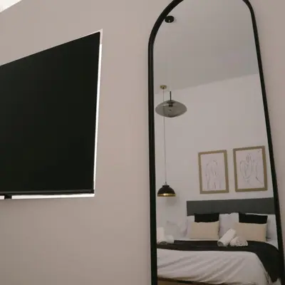 Cama o camas de una habitación en VETURIA APARTAMENTOS TURISTICOS