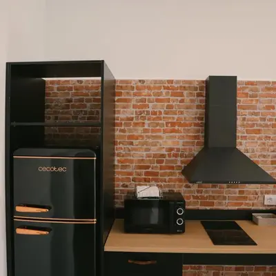 Una cocina o zona de cocina en VETURIA APARTAMENTOS TURISTICOS