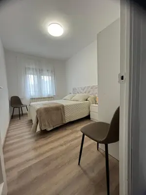 Cama o camas de una habitación en La Alameda