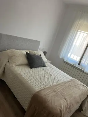 Cama o camas de una habitación en La Alameda