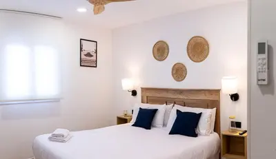 Cama o camas de una habitación en Apartamentos Cibeles Centro Histórico, Nuevo Establecimiento