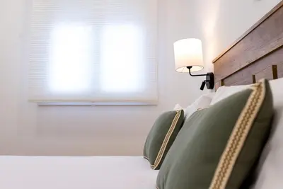 Cama o camas de una habitación en Apartamentos Cibeles Centro Histórico, Nuevo Establecimiento
