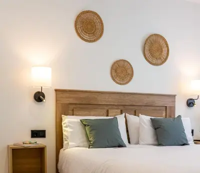 Cama o camas de una habitación en Apartamentos Cibeles Centro Histórico, Nuevo Establecimiento