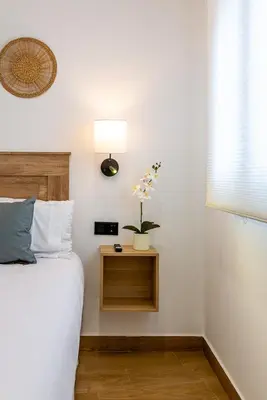Cama o camas de una habitación en Apartamentos Cibeles Centro Histórico, Nuevo Establecimiento