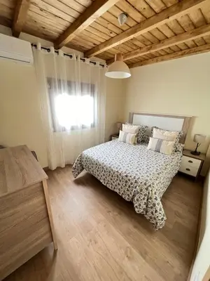 Cama o camas de una habitación en Casa Rural Casa Isabel