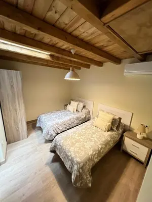 Cama o camas de una habitación en Casa Rural Casa Isabel