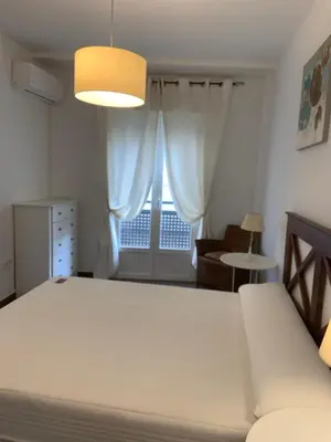 Cama o camas de una habitación en APARTAMENTO JALAMA 1B