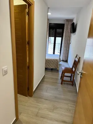 Cama o camas de una habitación en Hostal cazalegas