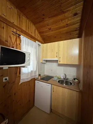 Una cocina o zona de cocina en Apartamentos LA CASONA DE JARAIZ