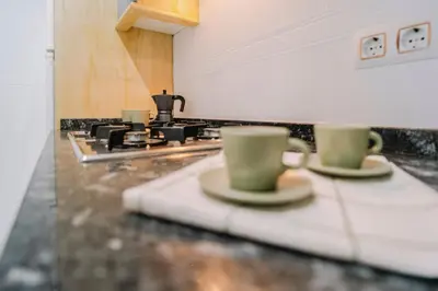 Una cocina o zona de cocina en Centro, Hospital y Campus Universitario a 5 minutos - Camas de primera - Lavadora - SmartTV - Wifi 1 GB - Teletrabajo