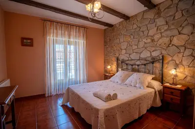 Cama o camas de una habitación en Casa Rural La TERRONA