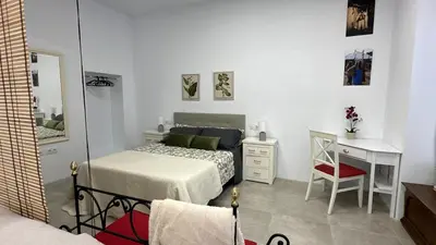 Cama o camas de una habitación en Pizarro 23, en el corazón de Cáceres