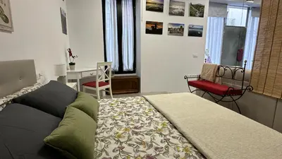 Cama o camas de una habitación en Pizarro 23, en el corazón de Cáceres