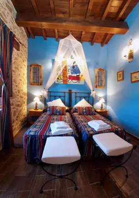 Cama o camas de una habitación en CASA RURAL SANDRA