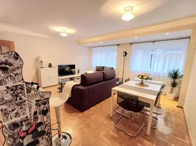 Una televisión o centro de entretenimiento en Apartamento San Vicente