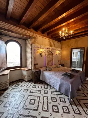 Cama o camas de una habitación en CASA RURAL EL TORREON