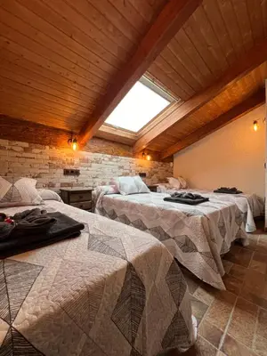 Cama o camas de una habitación en CASA RURAL EL TORREON