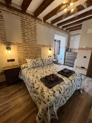 Cama o camas de una habitación en CASA RURAL EL TORREON