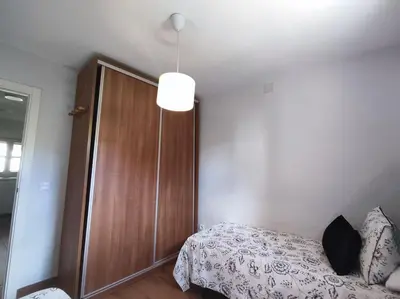 Cama o camas de una habitación en La casa de los Abuelos