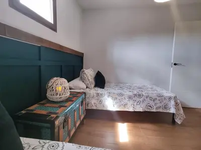 Cama o camas de una habitación en La casa de los Abuelos