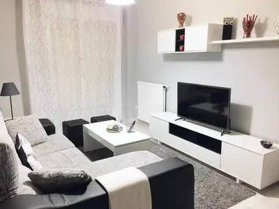 Una televisión o centro de entretenimiento en Amplio piso a 10 min de Salamanca by beBalmy