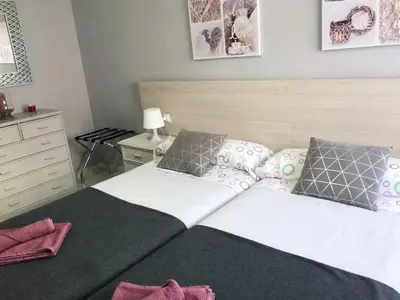 Cama o camas de una habitación en Amplio piso a 10 min de Salamanca by beBalmy