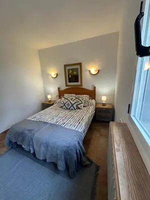 Cama o camas de una habitación en Casa Rural LA GUIJA