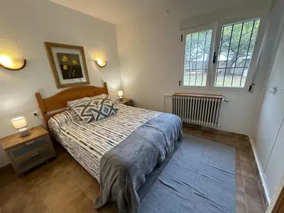 Cama o camas de una habitación en Casa Rural LA GUIJA