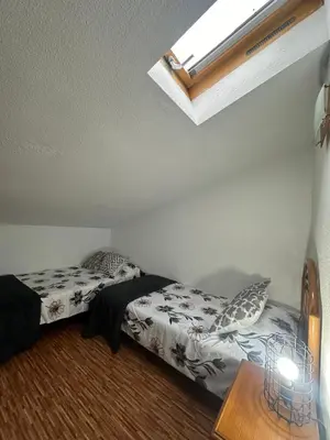Cama o camas de una habitación en Casa Rural LA GUIJA
