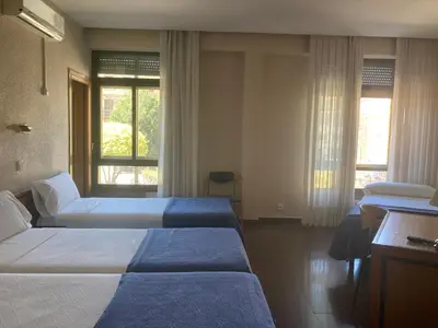 Cama o camas de una habitación en Hotel Condal