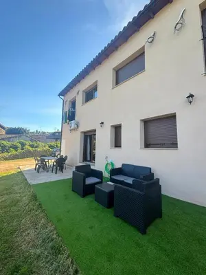 Zona de estar de Apartamentos rurales El Hondón del Lugar