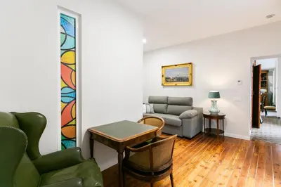 Zona de estar de Vultus - CatedralHomes