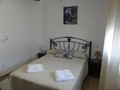 Cama o camas de una habitación en La casa del rollo