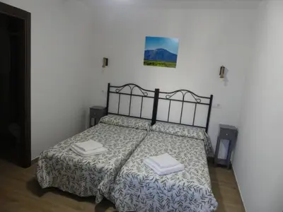 Cama o camas de una habitación en La casa del rollo