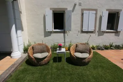 Zona de estar de Casa vacacional con piscina, pádel y BBQ
