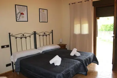 Cama o camas de una habitación en La Muralla de Gredos Hotel Rural