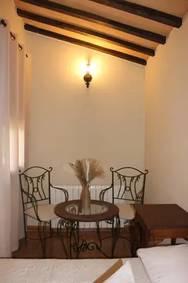 Cama o camas de una habitación en La Muralla de Gredos Hotel Rural